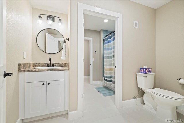 4193 W 99th Ct, Westminster, CO 80031 - bathroom featuring vanity, toilet, baseboards, and curtained shower