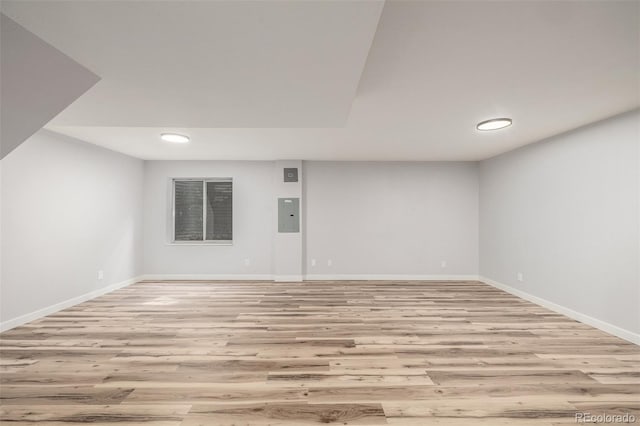 5316 S Jellison St, Littleton, CO 80123 - unfurnished room with light wood-style flooring, baseboards, electric panel, and recessed lighting