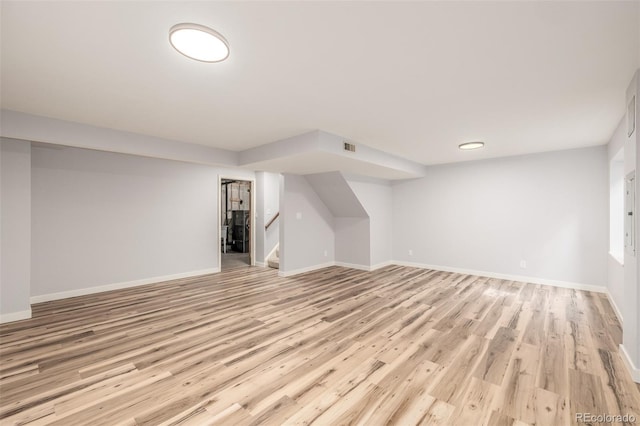 5316 S Jellison St, Littleton, CO 80123 - bonus room with light wood finished floors, baseboards, and stairway