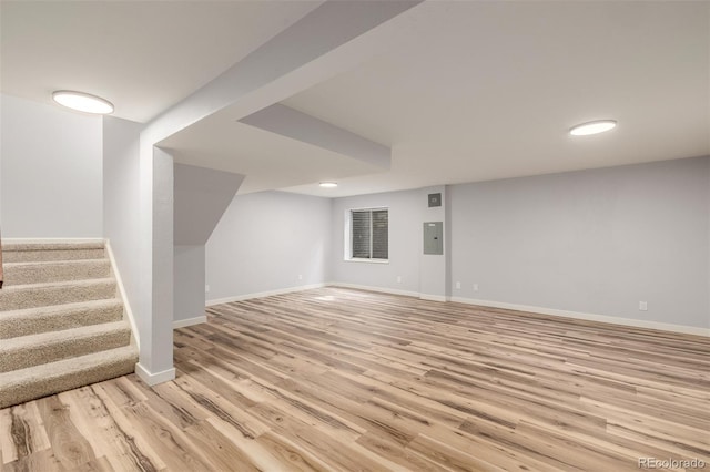5316 S Jellison St, Littleton, CO 80123 - finished basement with light wood-style flooring, electric panel, stairway, baseboards, and recessed lighting