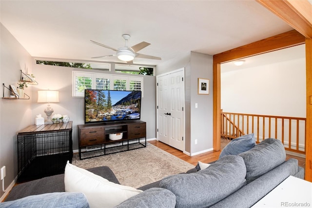 4545 S Lipan Ct, Englewood, CO 80110 - living area featuring ceiling fan, wood finished floors, and baseboards