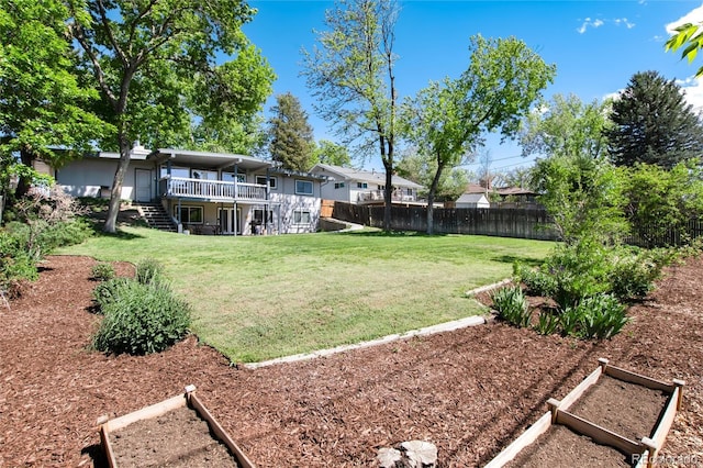4545 S Lipan Ct, Englewood, CO 80110 - view of yard featuring stairs and a wooden deck