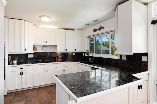 4545 S Lipan Ct, Englewood, CO 80110 - kitchen with a sink, tile countertops, and white cabinetry