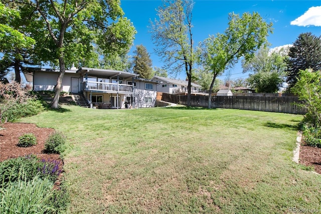 4545 S Lipan Ct, Englewood, CO 80110 - view of yard with stairway and a deck