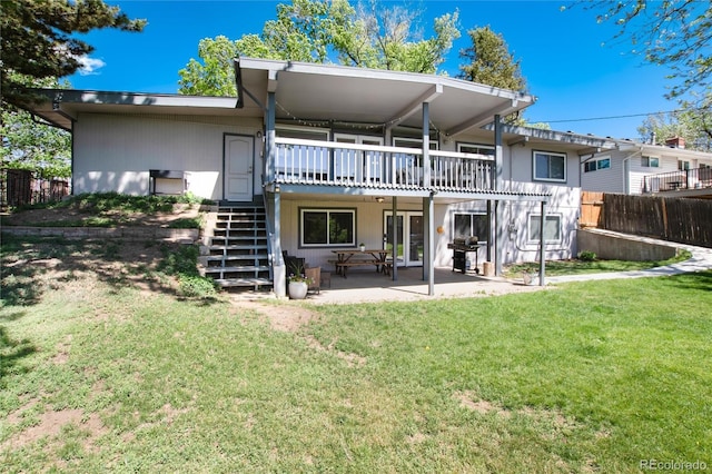 4545 S Lipan Ct, Englewood, CO 80110 - rear view of house with stairs, a deck, and a patio area