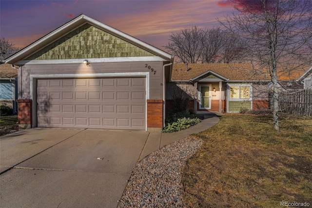 view of front of property featuring a garage