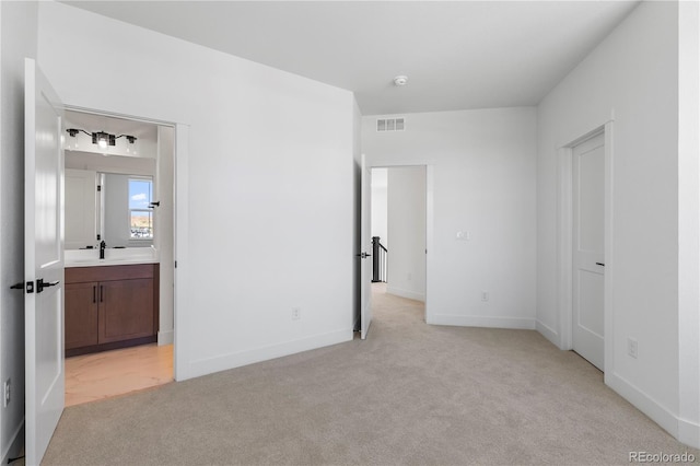 5626 W 142nd Ave, Broomfield, CO 80020 - unfurnished bedroom featuring light carpet and ensuite bathroom
