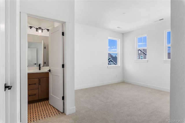 5626 W 142nd Ave, Broomfield, CO 80020 - unfurnished bedroom with light carpet and ensuite bathroom