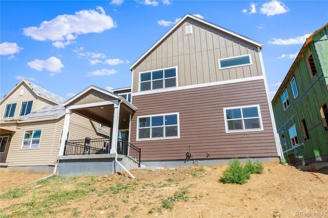 5626 W 142nd Ave, Broomfield, CO 80020 - back of house featuring board and batten siding