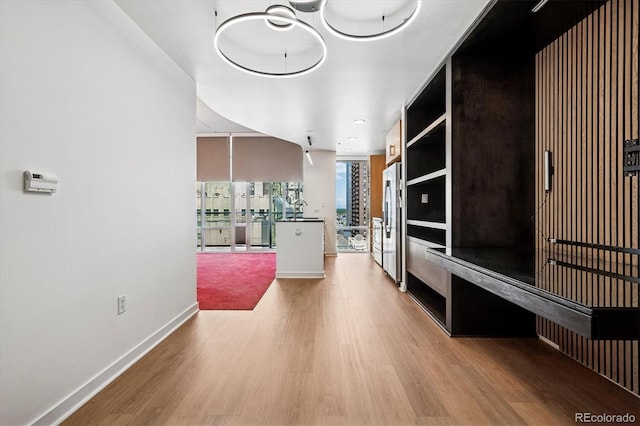 891 14th St Unit 2105, Denver, CO 80202 - living area featuring wood finished floors and floor to ceiling windows
