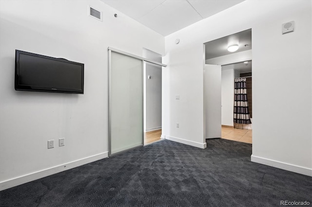 891 14th St Unit 2105, Denver, CO 80202 - unfurnished bedroom featuring carpet flooring and baseboards