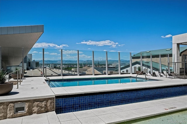 891 14th St Unit 2105, Denver, CO 80202 - view of swimming pool featuring a mountain view
