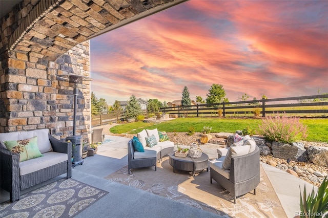 11522 Trona Ct, Parker, CO 80138 - fenced backyard with an outdoor living space and a patio area