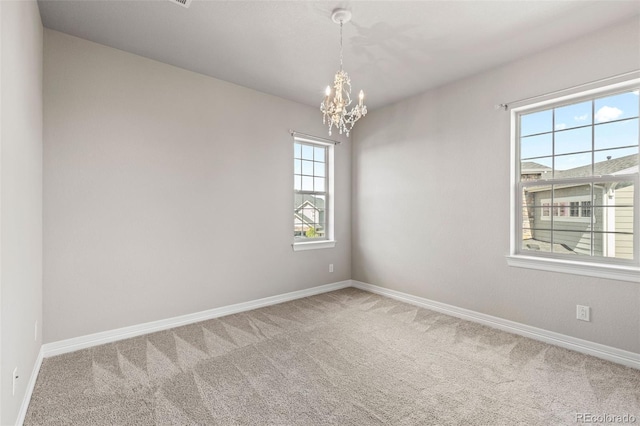 11522 Trona Ct, Parker, CO 80138 - empty room featuring carpet floors, a chandelier, and baseboards