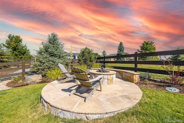 11522 Trona Ct, Parker, CO 80138 - patio terrace at dusk with a fire pit and a patio