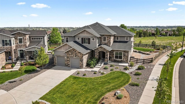 11522 Trona Ct, Parker, CO 80138 - view of front of home with stone siding, driveway, roof with shingles, and a residential view