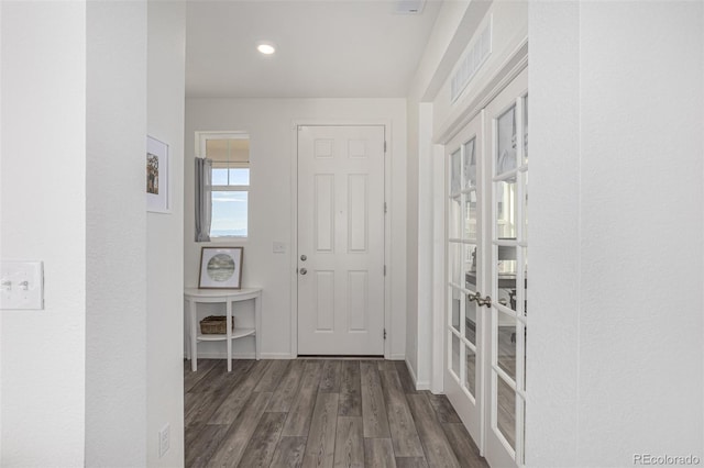 hallway featuring dark hardwood / wood-style flooring