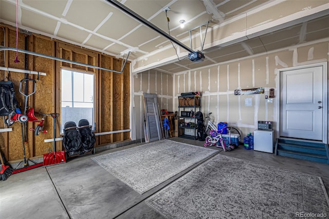 garage featuring a garage door opener