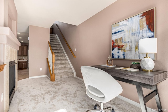 office space with recessed lighting, baseboards, and light colored carpet