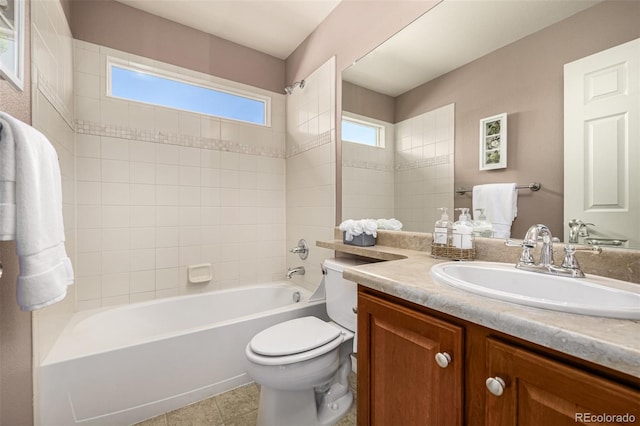 full bath with tile patterned flooring, tub / shower combination, vanity, and toilet