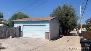 160 Utica St, Denver, CO 80219 - detached garage featuring fence