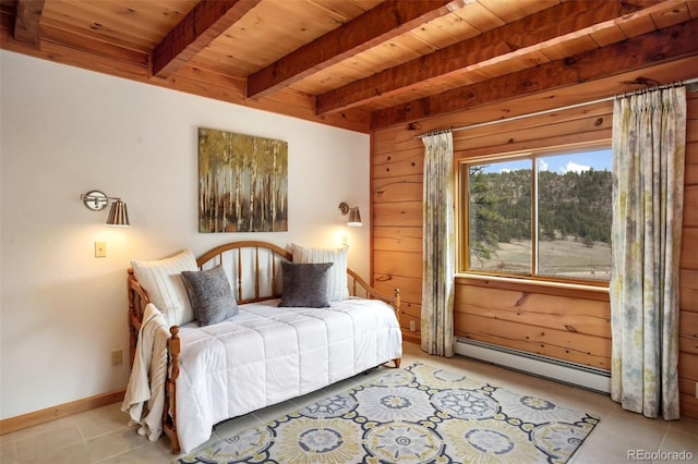 bedroom featuring beam ceiling, wooden walls, tile patterned floors, wooden ceiling, and a baseboard radiator