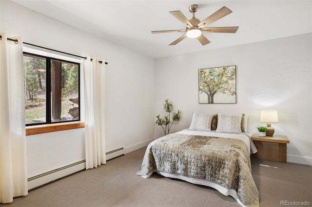 bedroom with carpet floors, a baseboard radiator, baseboards, and ceiling fan