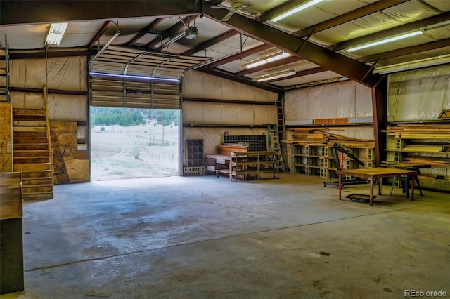 garage with a workshop area