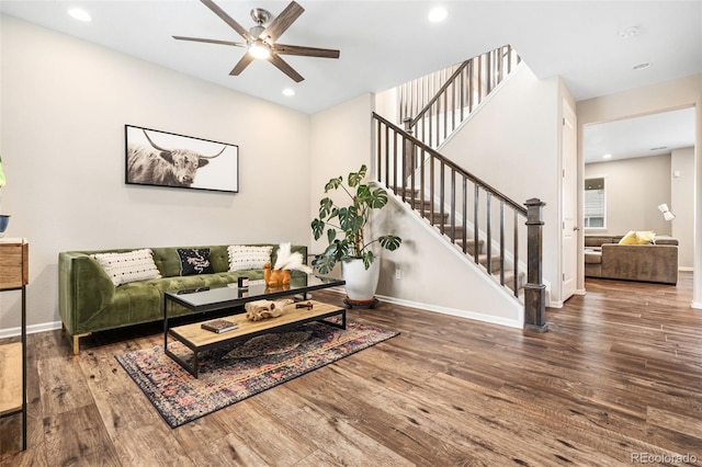 18077 E 99th Ave, Commerce City, CO 80022 - living room with ceiling fan, wood finished floors, stairway, and recessed lighting