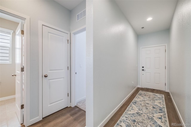 8517 Eckley St, Littleton, CO 80125 - hallway with wood finished floors and baseboards