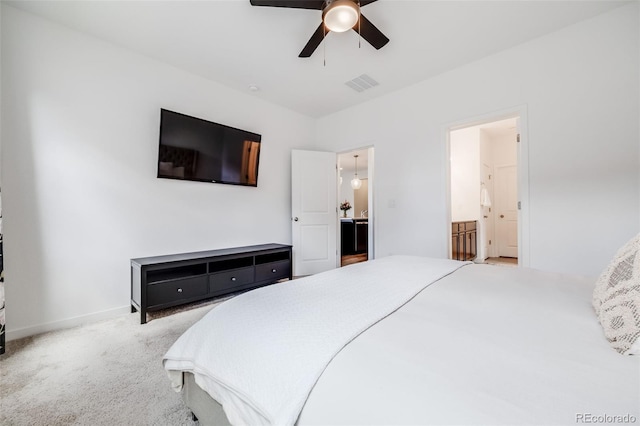 8517 Eckley St, Littleton, CO 80125 - bedroom with carpet flooring, ensuite bath, baseboards, and a ceiling fan