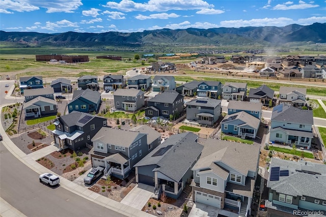 8517 Eckley St, Littleton, CO 80125 - aerial perspective of suburban area with a mountain backdrop