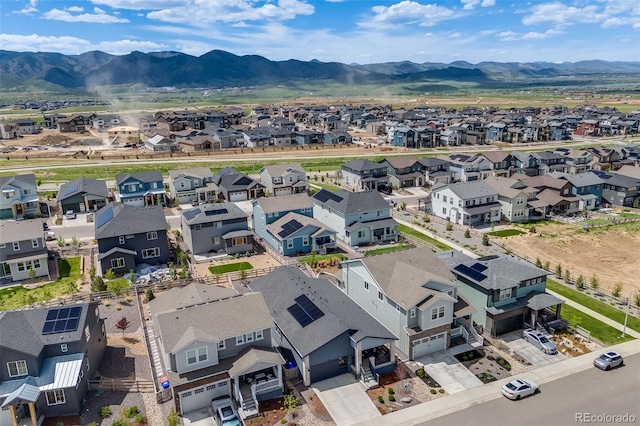 8517 Eckley St, Littleton, CO 80125 - aerial perspective of suburban area with a mountainous background
