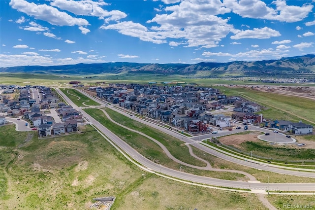 8517 Eckley St, Littleton, CO 80125 - aerial view of residential area featuring a mountain backdrop