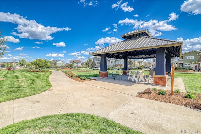 view of community featuring a gazebo and a lawn