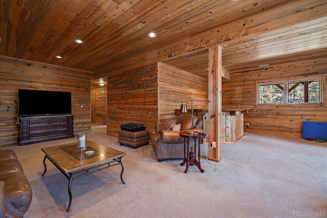 living area with wooden ceiling, carpet, and wooden walls