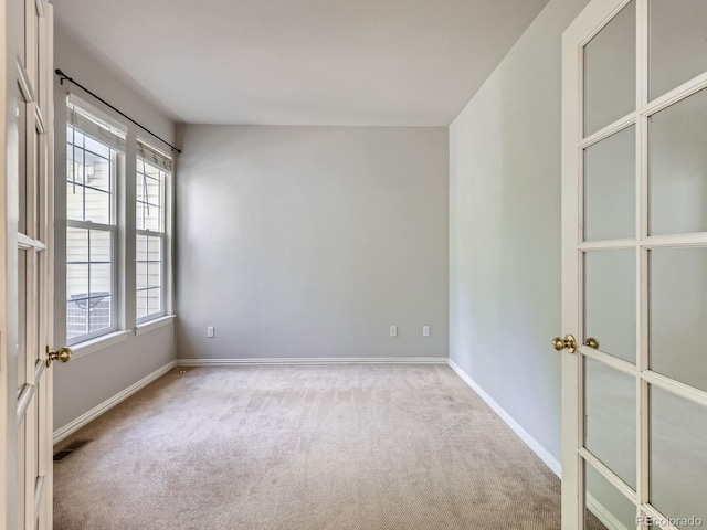 5155 W Quincy Ave Unit J103, Denver, CO 80236 - empty room with carpet floors and baseboards