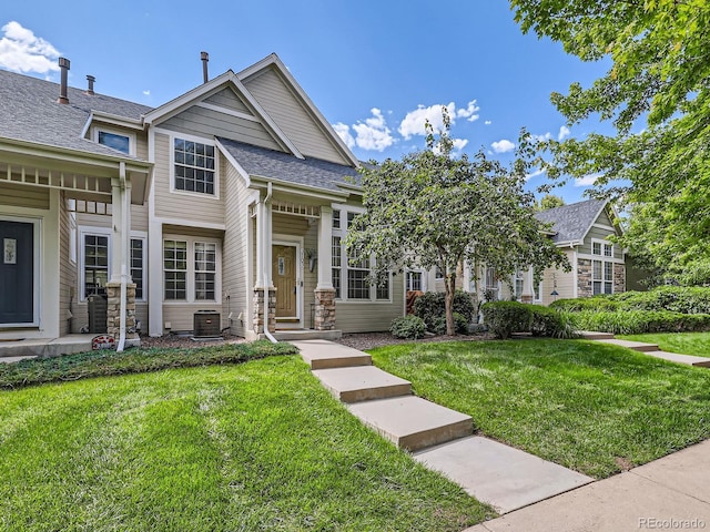5155 W Quincy Ave Unit J103, Denver, CO 80236 - view of front of house with a front lawn