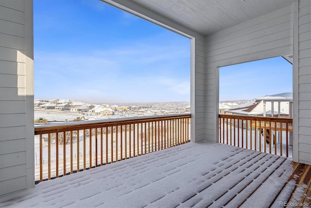 view of snow covered deck