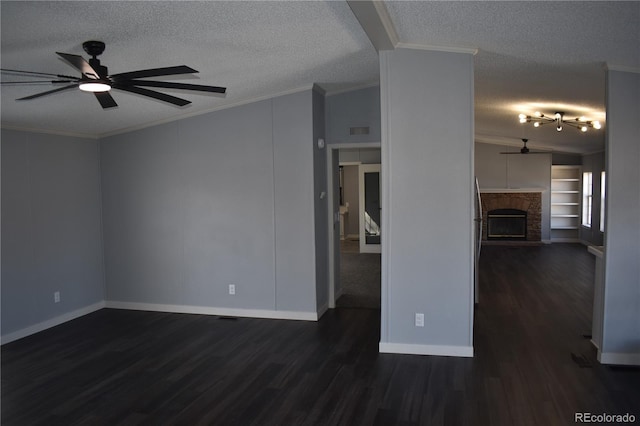 unfurnished living room with a ceiling fan, ornamental molding, and wood finished floors