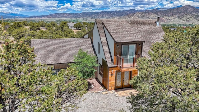 6375 Terrace Ln, Salida, CO 81201 - view of front of home featuring a mountain view, french doors, and a balcony