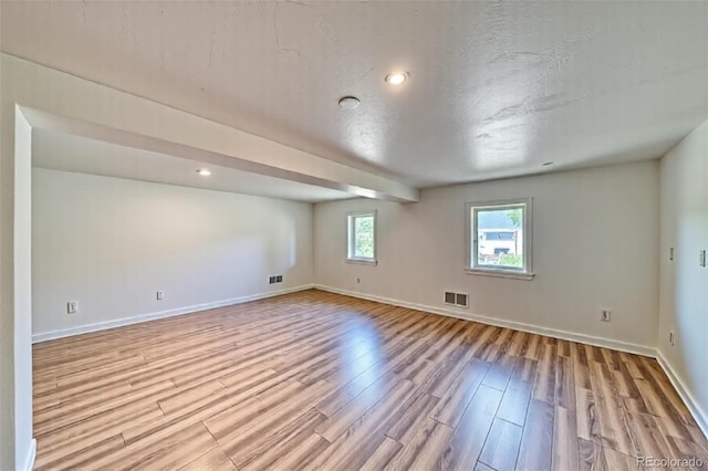 6375 Terrace Ln, Salida, CO 81201 - empty room featuring wood finished floors, a textured ceiling, and recessed lighting