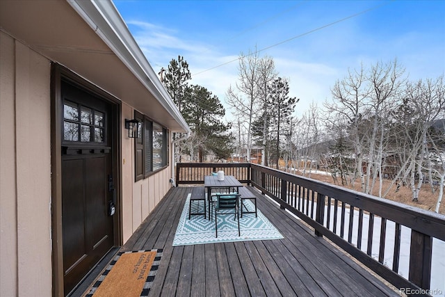 view of snow covered deck