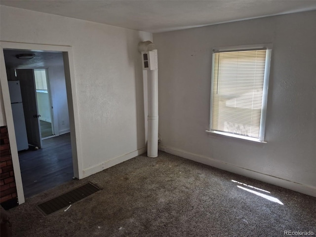 1272 N Ulster St, Denver, CO 80220 - carpeted spare room with baseboards