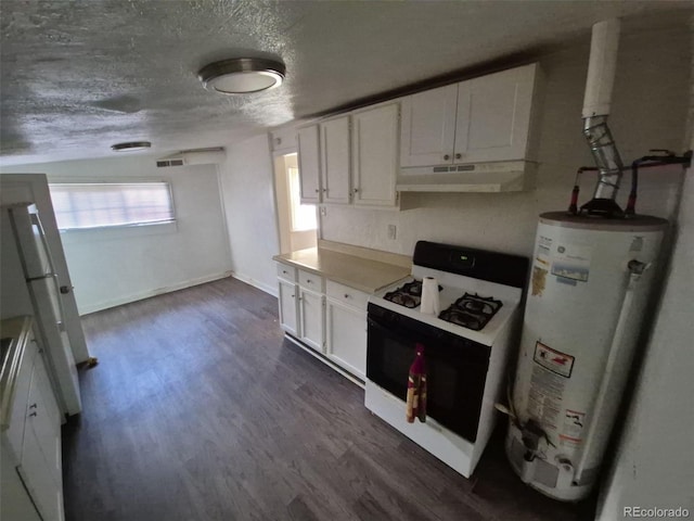 1272 N Ulster St, Denver, CO 80220 - kitchen featuring under cabinet range hood, gas range oven, gas water heater, white cabinets, and dark wood finished floors