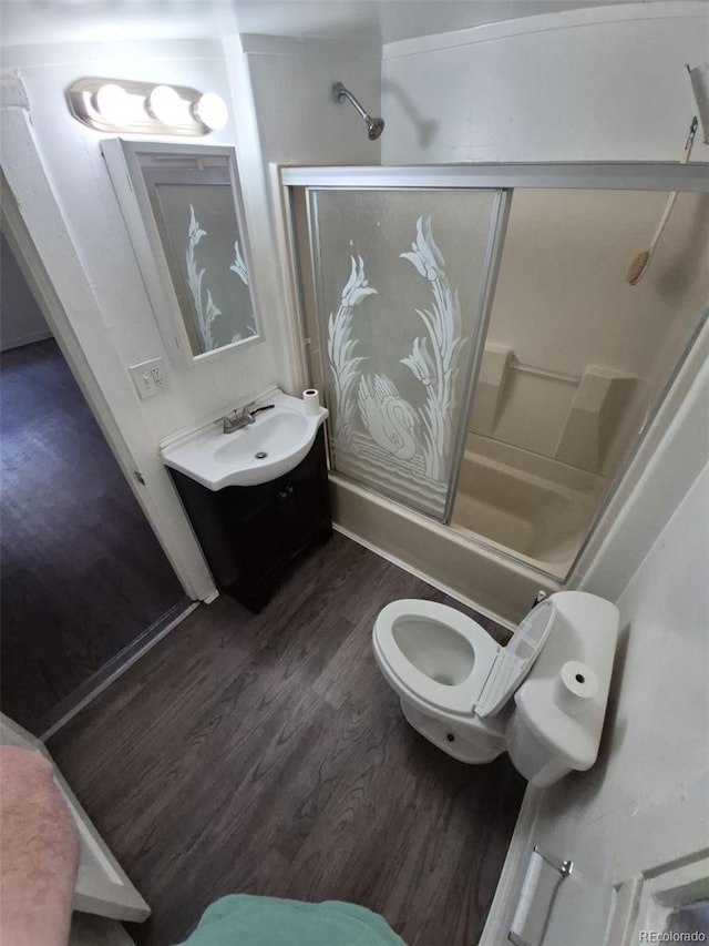 1272 N Ulster St, Denver, CO 80220 - full bathroom featuring toilet, wood finished floors, and vanity