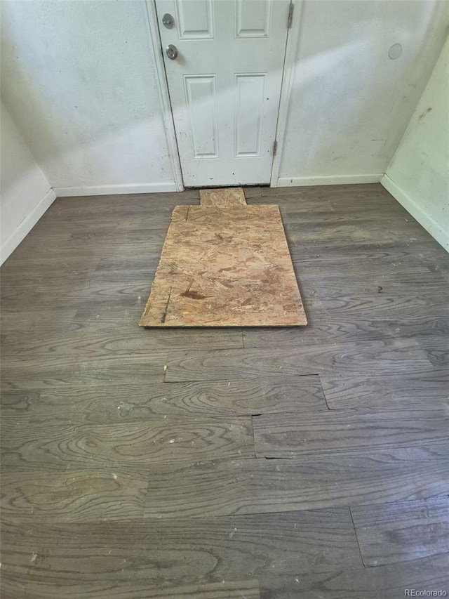 1272 N Ulster St, Denver, CO 80220 - detailed view of baseboards and wood finished floors