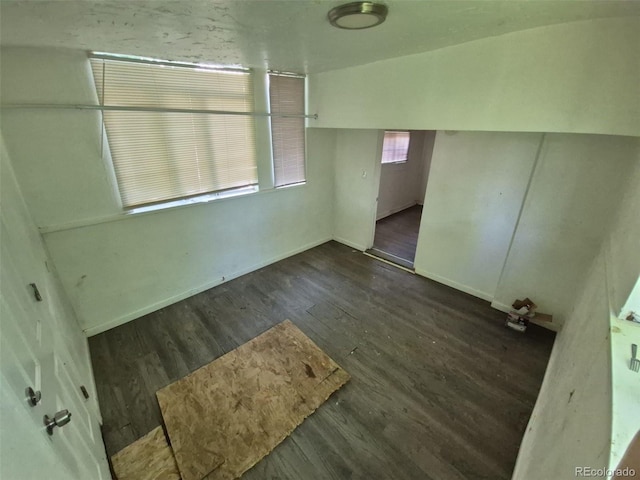 1272 N Ulster St, Denver, CO 80220 - unfurnished bedroom featuring wood finished floors and baseboards