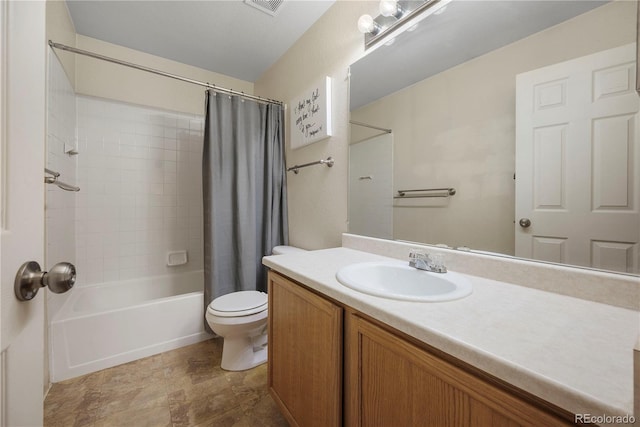 full bathroom featuring vanity, toilet, and shower / bath combo with shower curtain