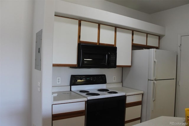 kitchen featuring white cabinets, electric panel, and white appliances